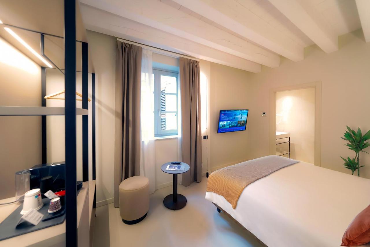 Bergamo Inn 21 المظهر الخارجي الصورة A room at the hotel